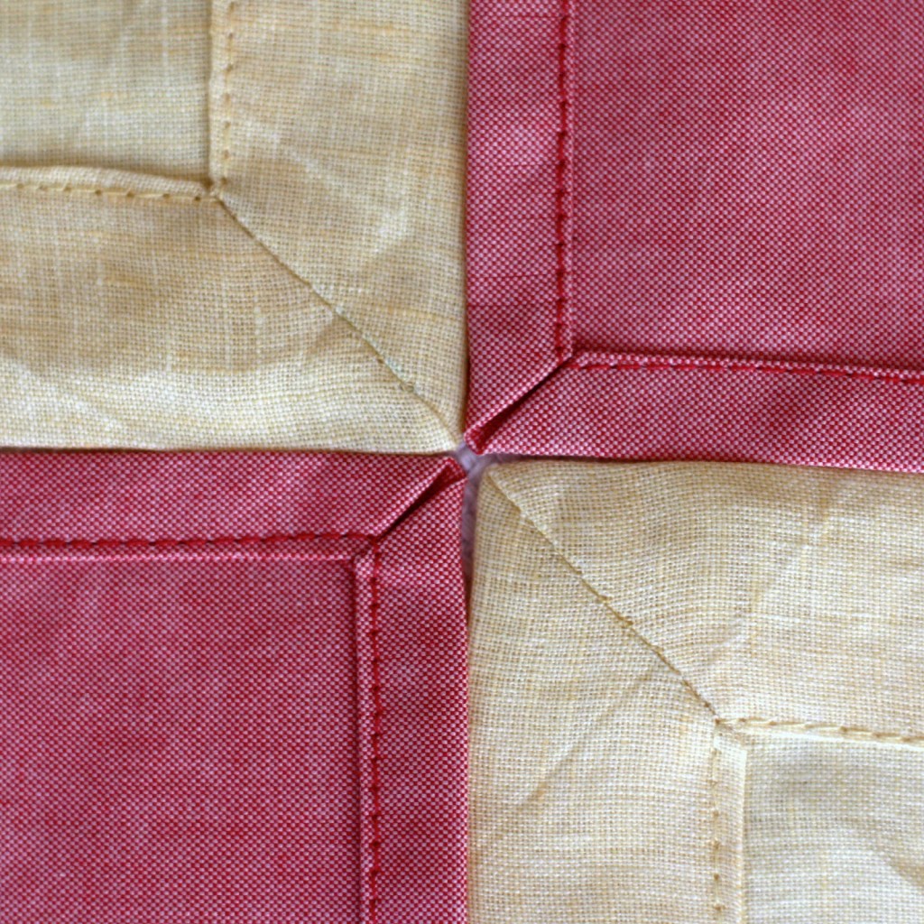 Two ways, two fabrics for mitered napkins.
